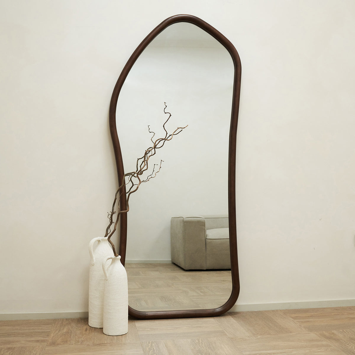 Full Length Dark Wood Organic Irregular Wooden Mirror leaning against wall