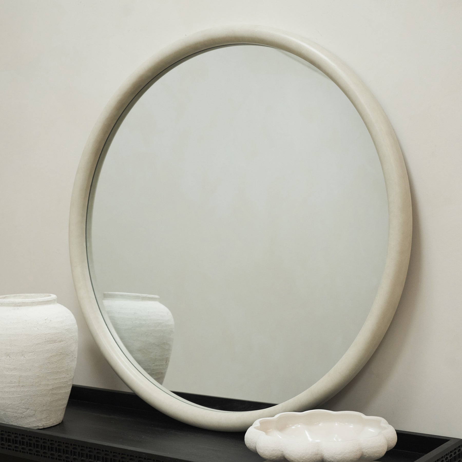 Our Large Concrete Round Wall Mirror in a typical setting