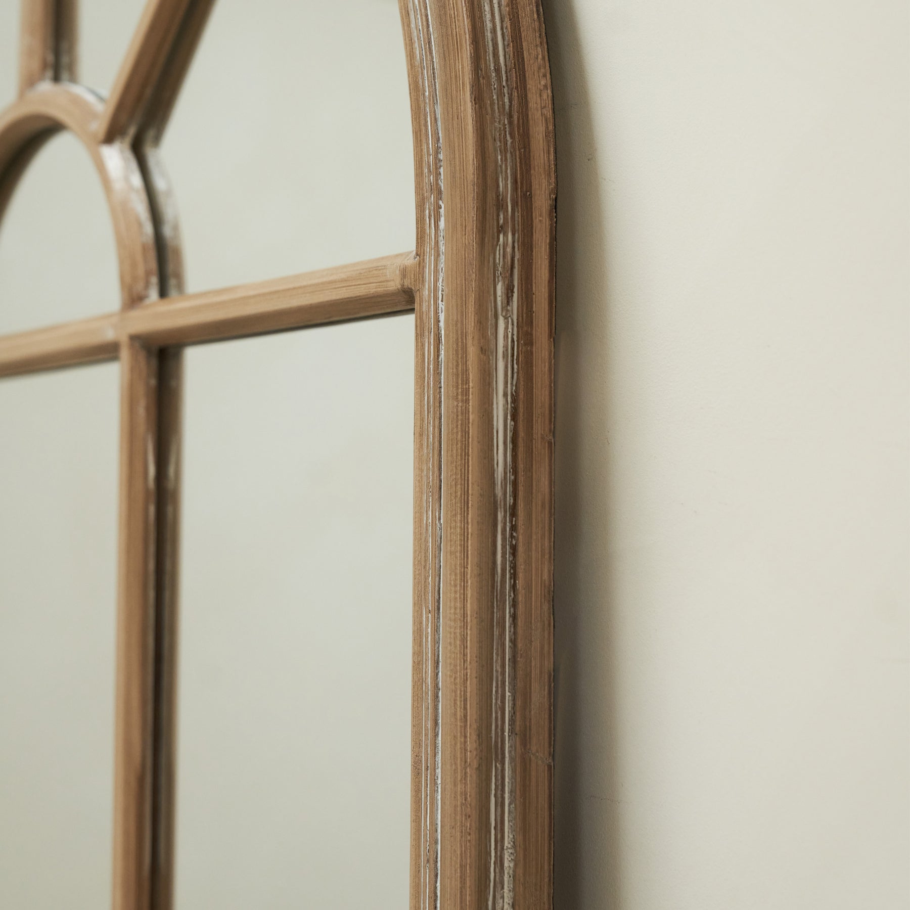 Detail shot of Large Washed Wood Arched Shabby Chic Window Mirror frame texture