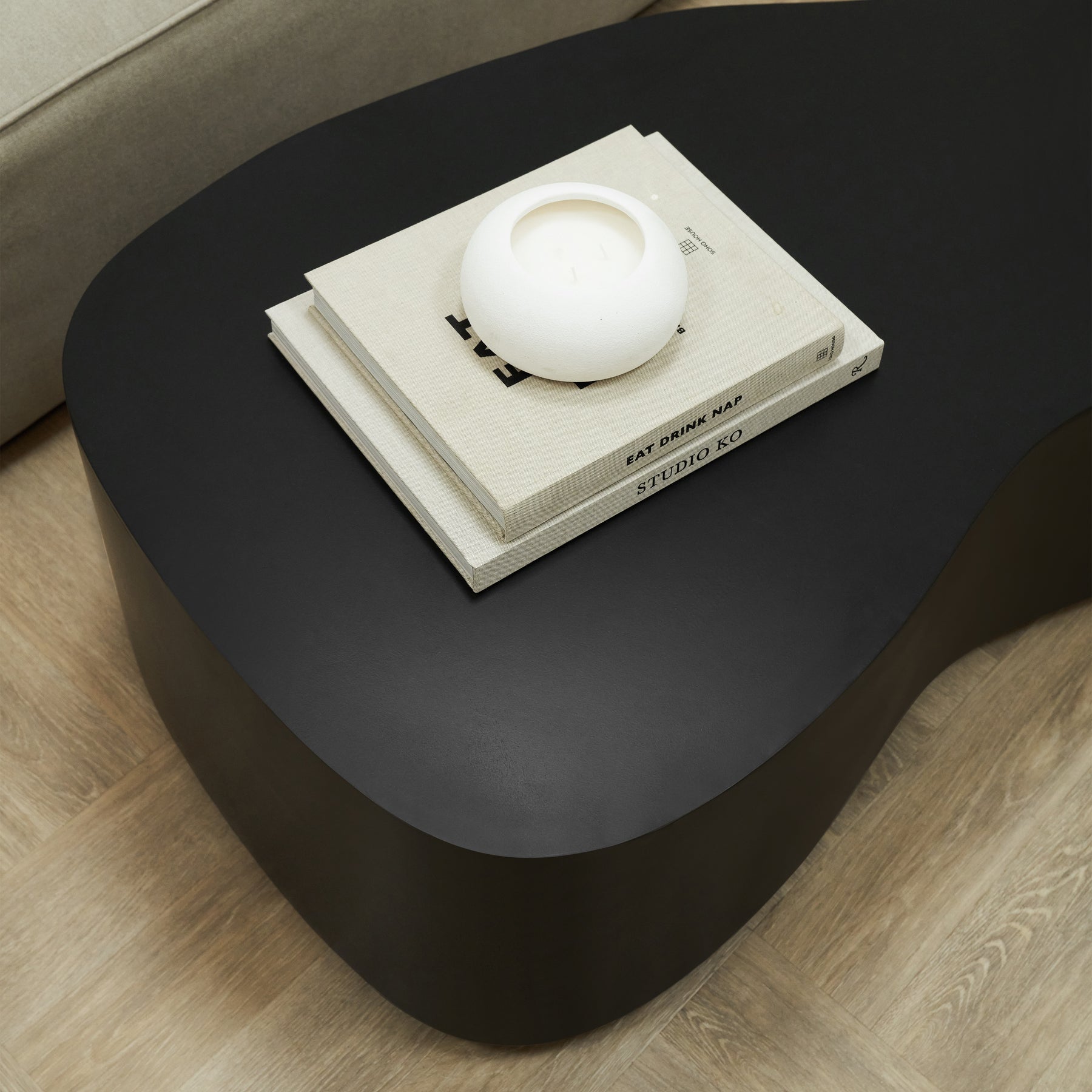 Top-down view of Minimal Black Large Irregular Shaped Coffee Table