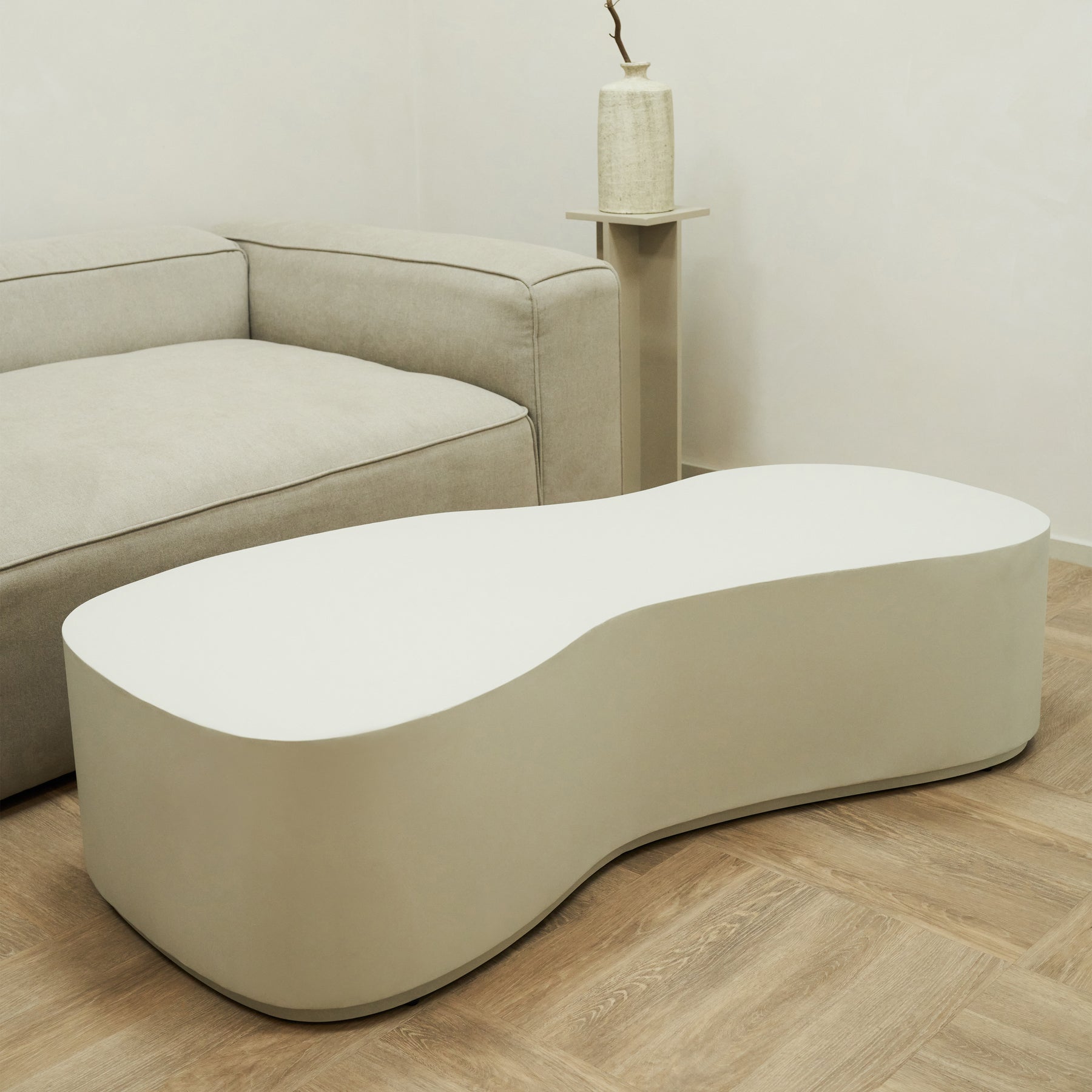 Undecorated Minimal Concrete Large Irregular Shaped Coffee Table in lounge setting