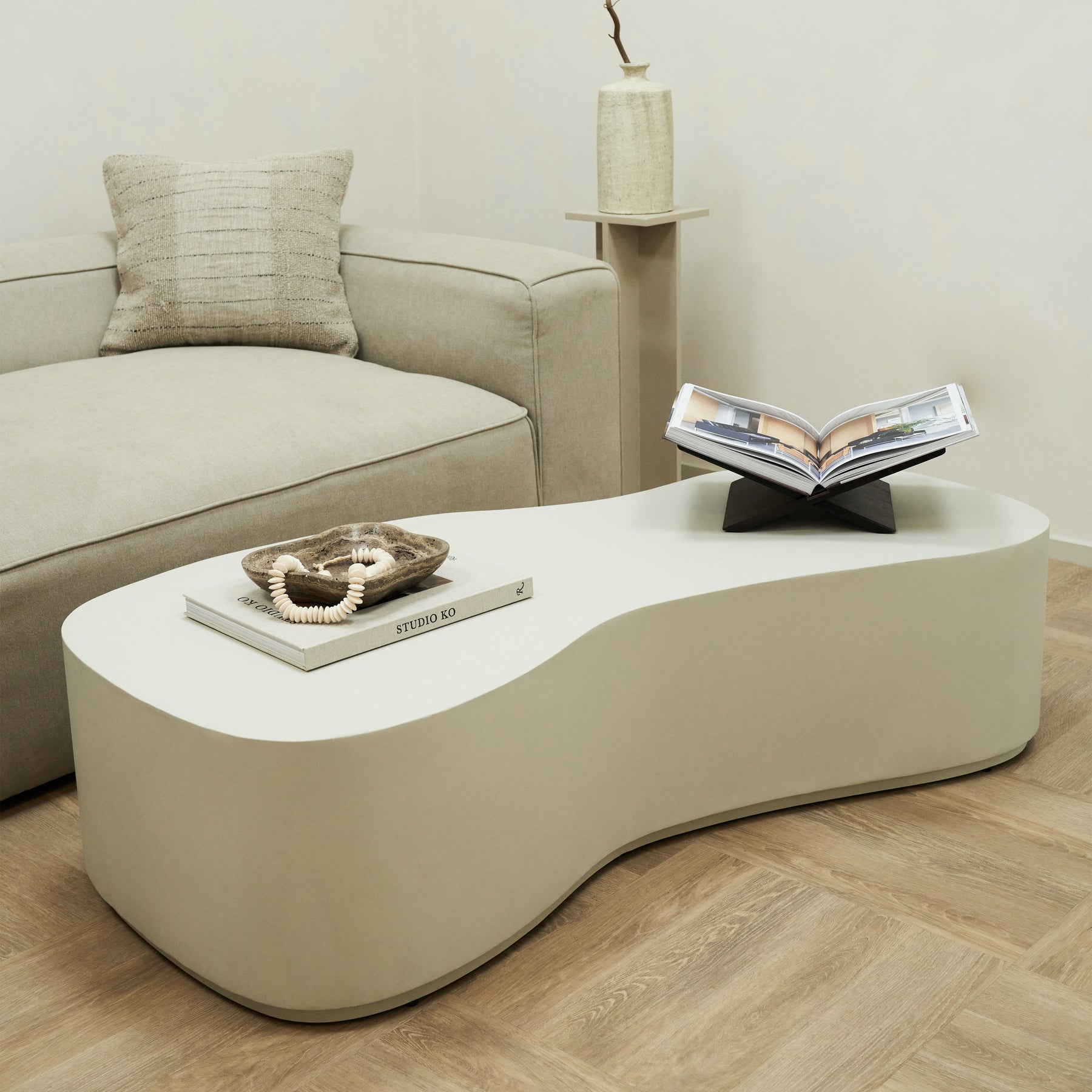 Minimal Concrete Large Irregular Shaped Coffee Table in living room setting