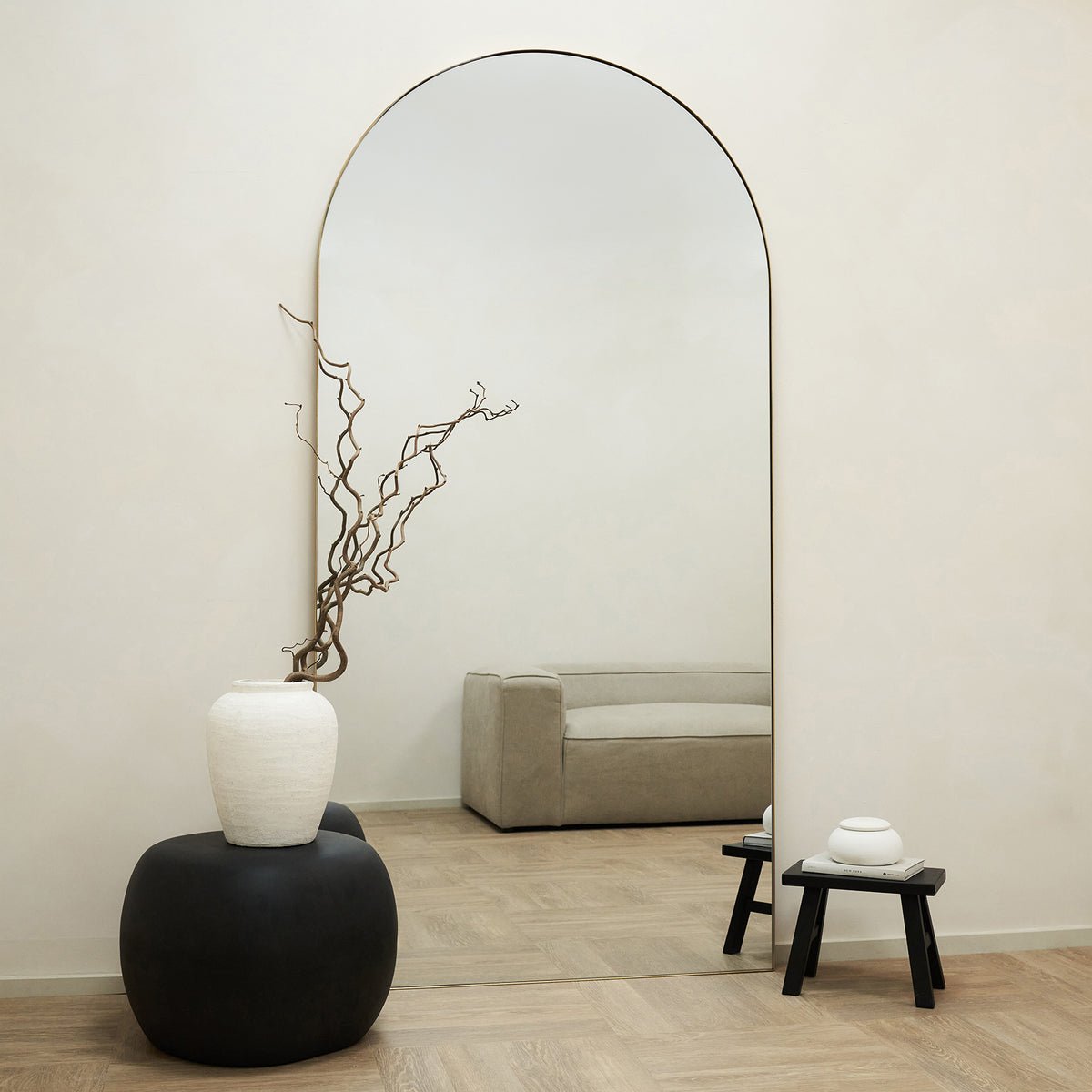 Full Length Extra Large Gold Arched Metal Mirror leaning against wall