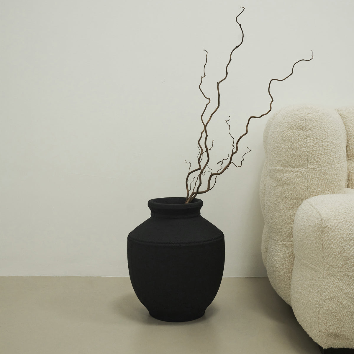 Black Textured Terracotta Vase in a typical setting