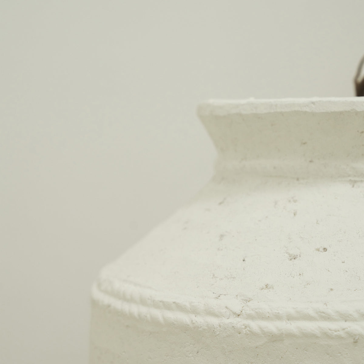 Detail shot of White Textured Terracotta Vase