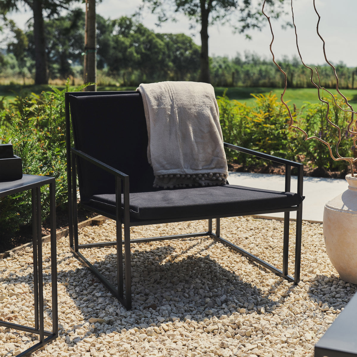 Black Modern Rectangular Garden Chair with draped shawl