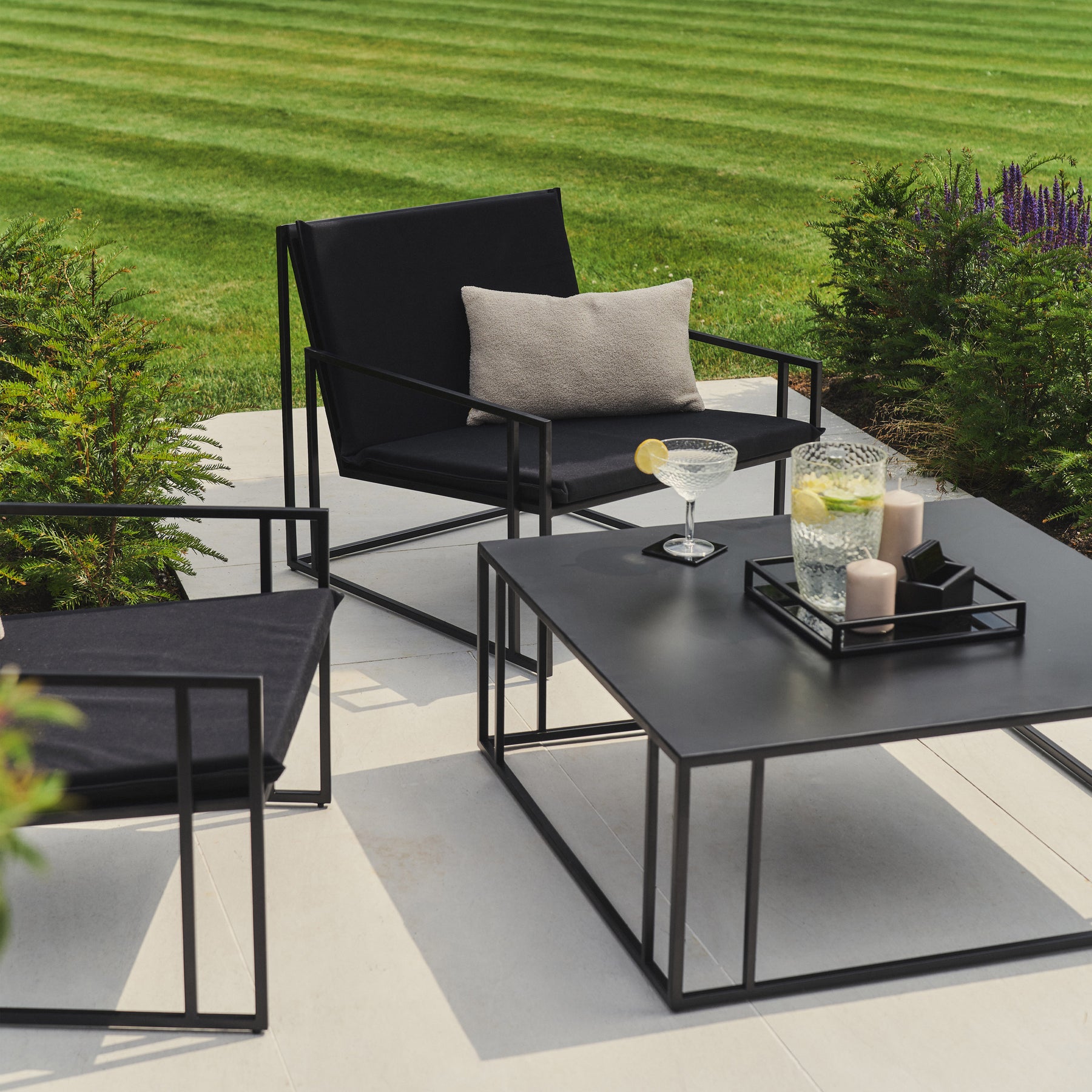 Rectangular Black Modern Garden Furniture Set with citrus drink