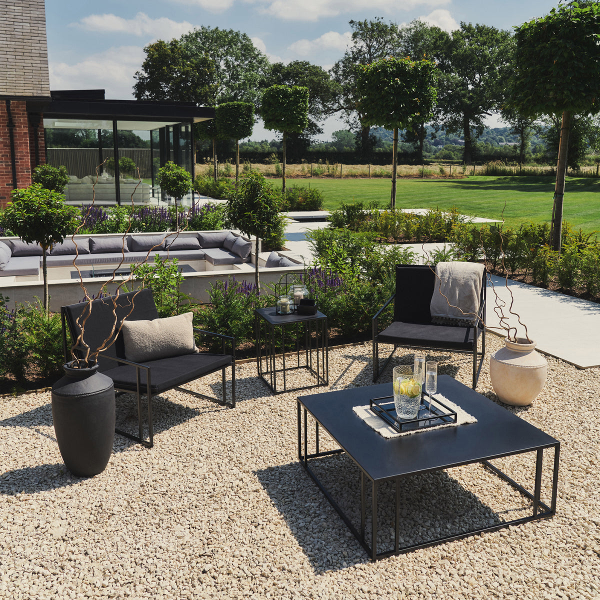 Black Modern Rectangular Garden Furniture Set in a typical setting