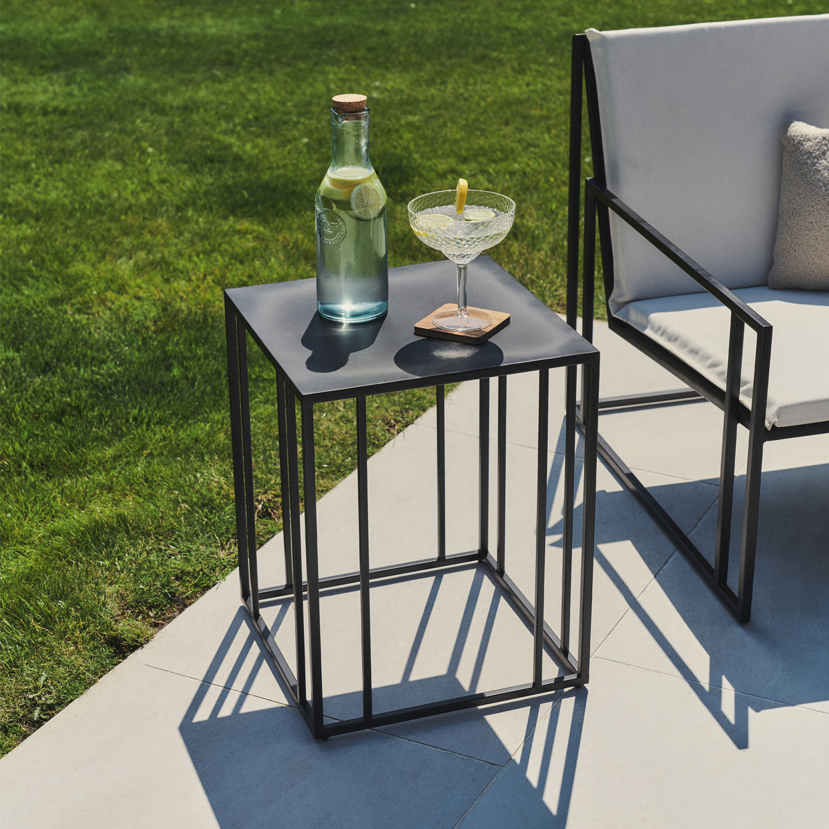 Black Modern Rectangular Garden Side Table with citrus drink