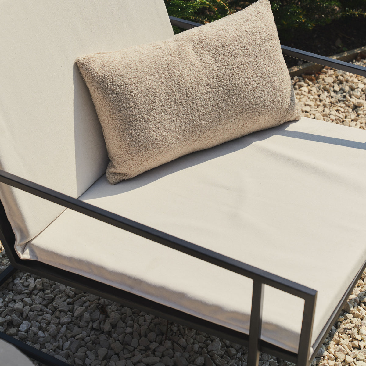 Detail shot of Sand Modern Rectangular Garden Chair on gravel