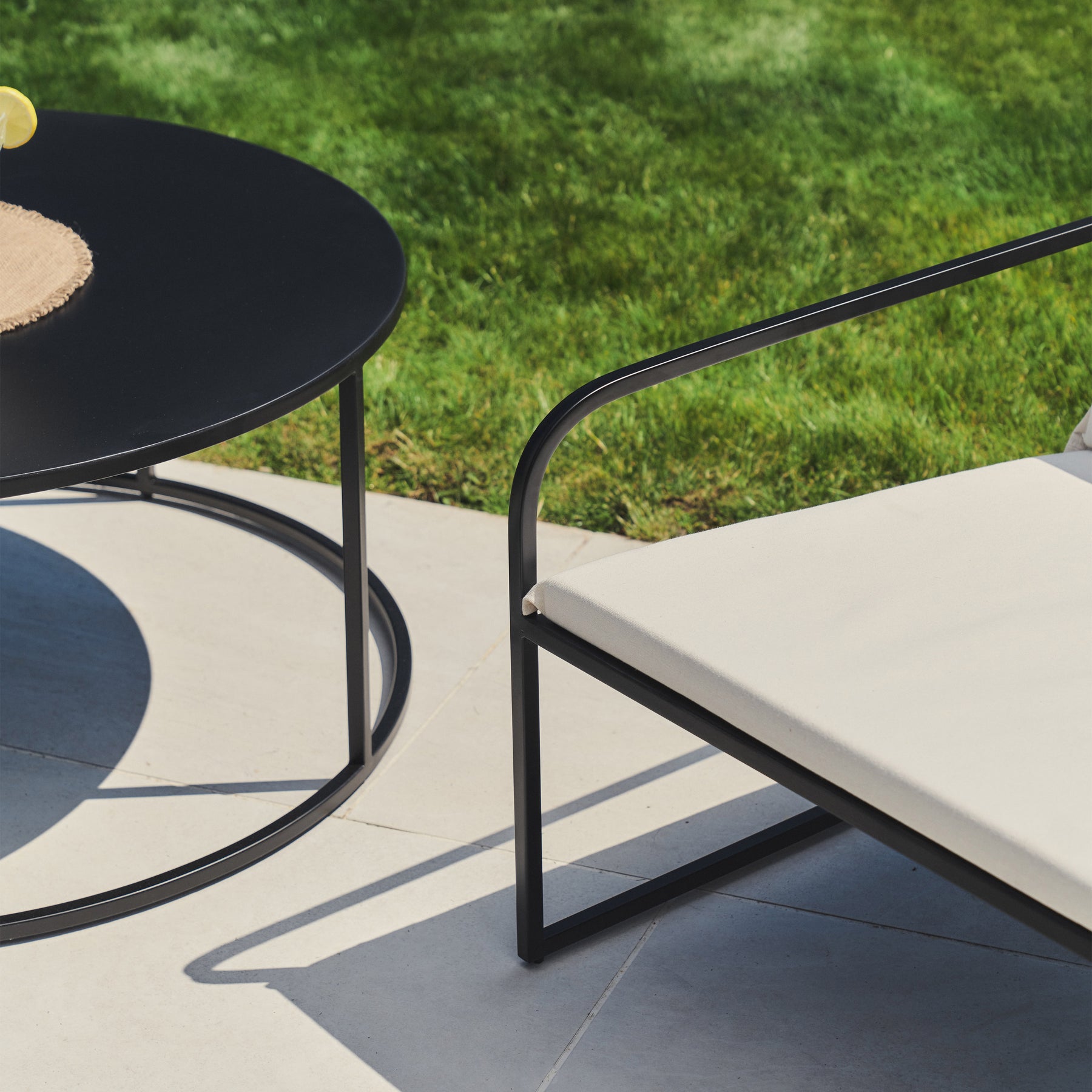 Sand Modern Rounded Garden Chair beside table