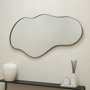 Black Metal Pond Shaped Irregular Wall Mirror above console table