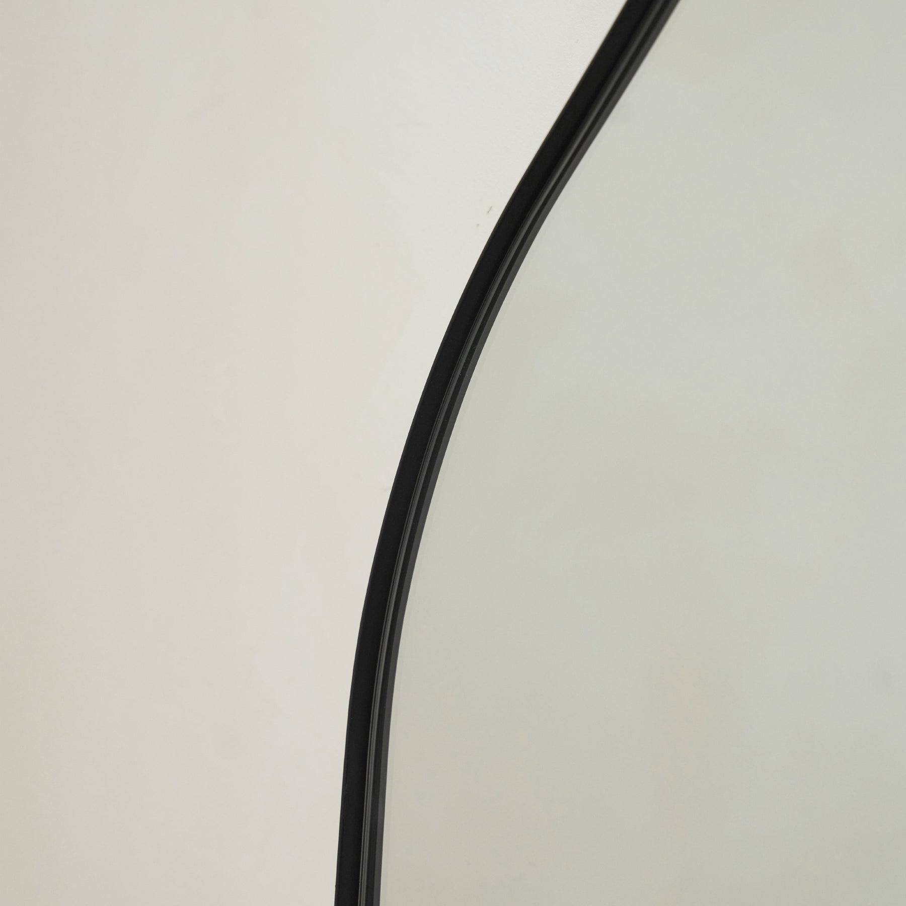 Detail shot of Large Irregular Arched Black Metal Wall Mirror irregular curve